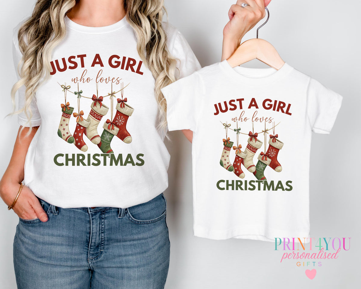 Mum and daughter wearing matching personalised Christmas stocking design t-shirts with custom name, adult and child sizes