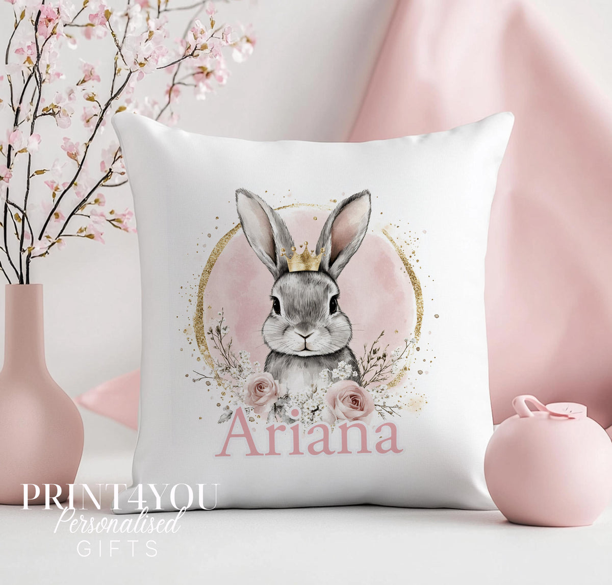 Cushion printed with a personalised bunny design on a floral background