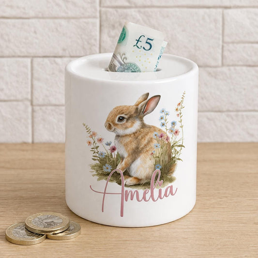 Ceramic bunny-shaped money box personalised with a child's name