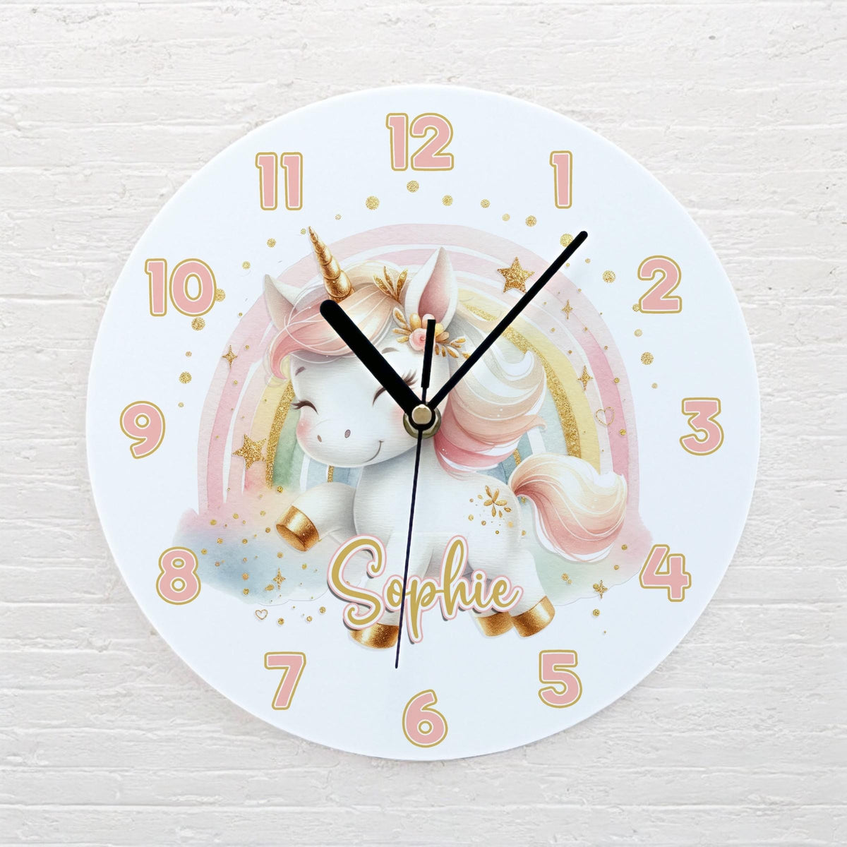 Personalised unicorn and rainbow acrylic clock displayed on a child's bedroom wall