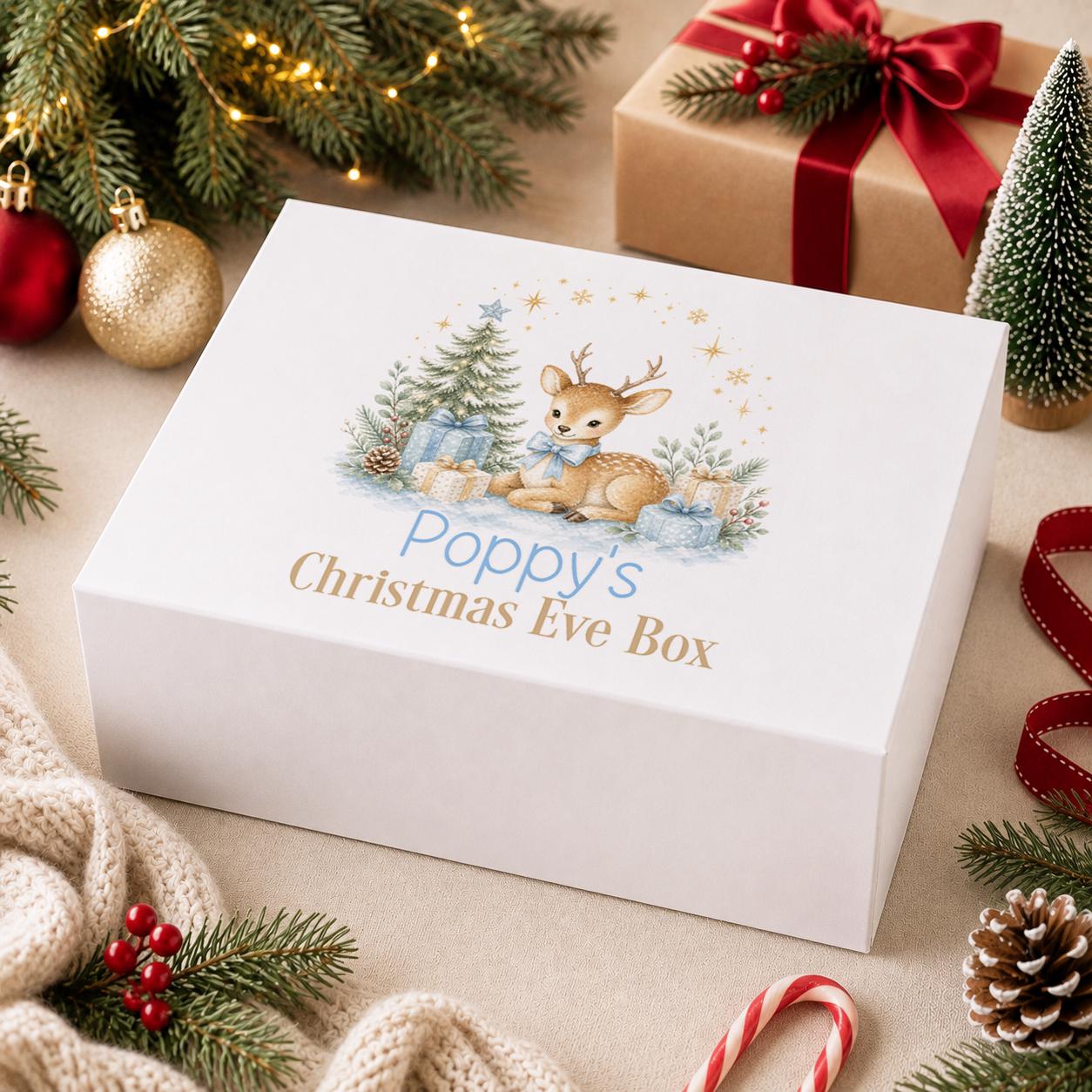 Personalised Christmas Eve box, white magnetic gift box printed with a reindeer and snowy Christmas trees and a name above Christmas Eve Box