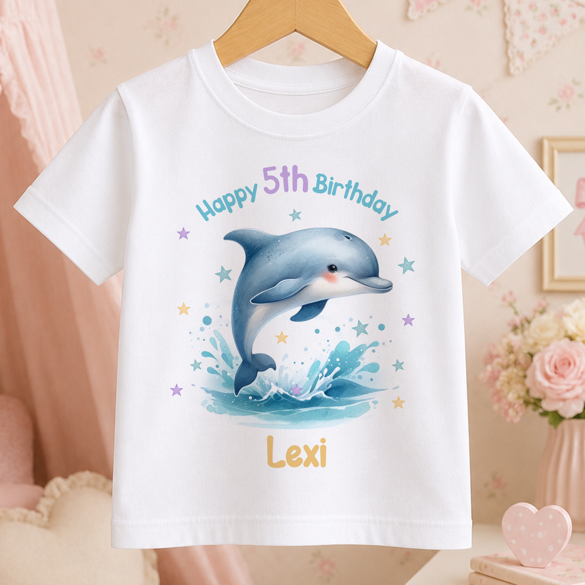 White children's t-shirt personalised with a jumping dolphin, stars and a custom birthday name and age