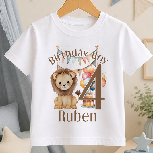 A white t-shirt with a printed design featuring a lion and balloons, along with the text "Birthday Boy Ruben" and the number "4".