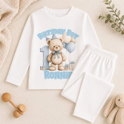 Personalised blue teddy bear 1st birthday pyjamas with the child's name printed on soft cotton