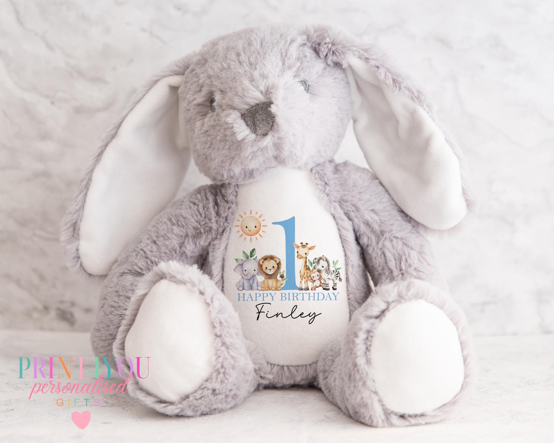 White personalised first birthday bunny soft toy with safari design printed on tummy