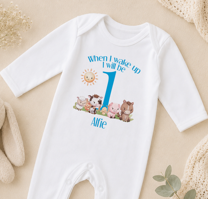 White onesie printed with a personalised birthday message and farmyard cartoon animals.