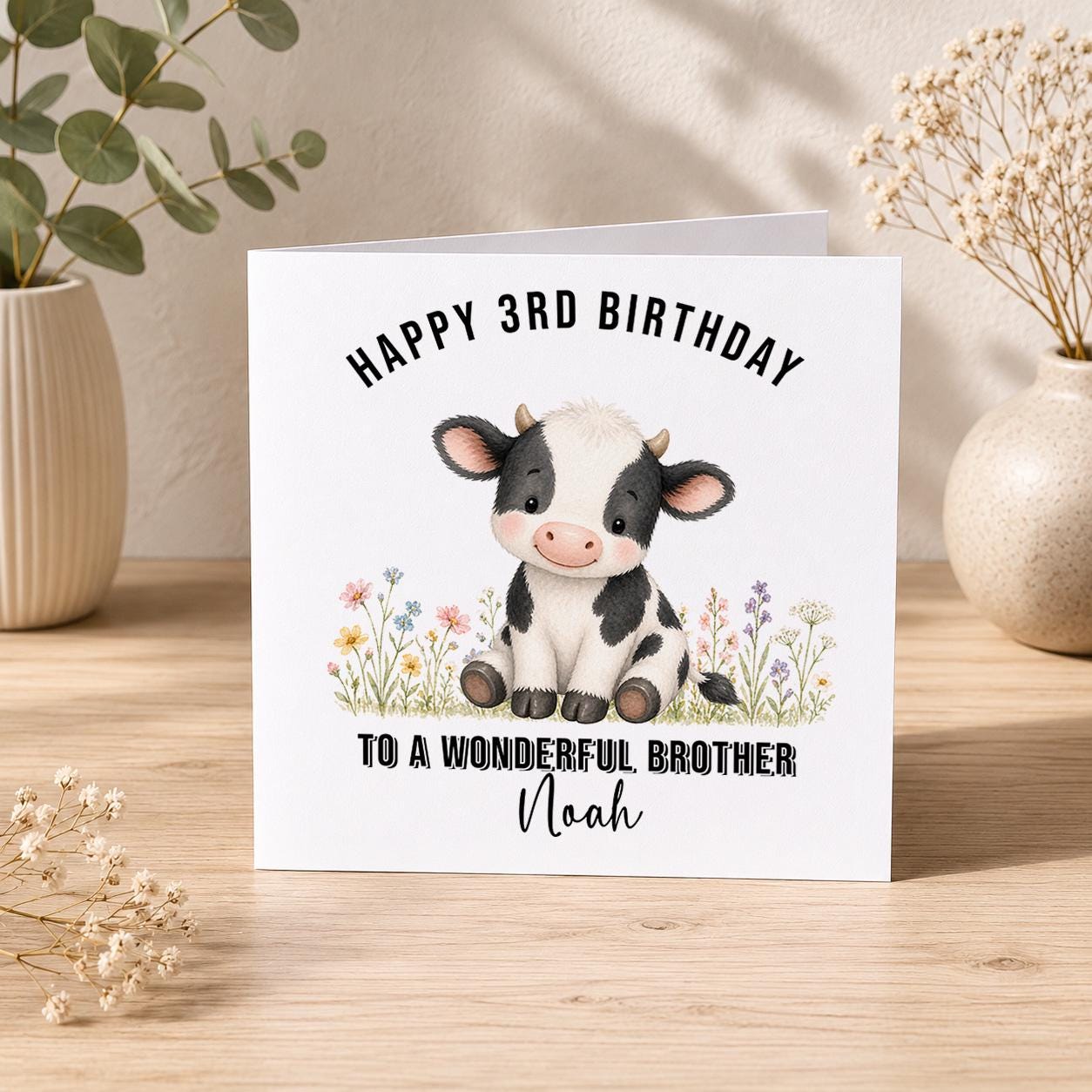 Square greeting card showing the boys birthday card design