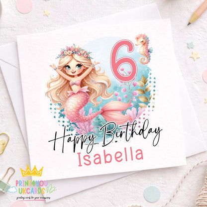 Square birthday card front featuring an illustrated mermaid design, personalised with a girl's name and age