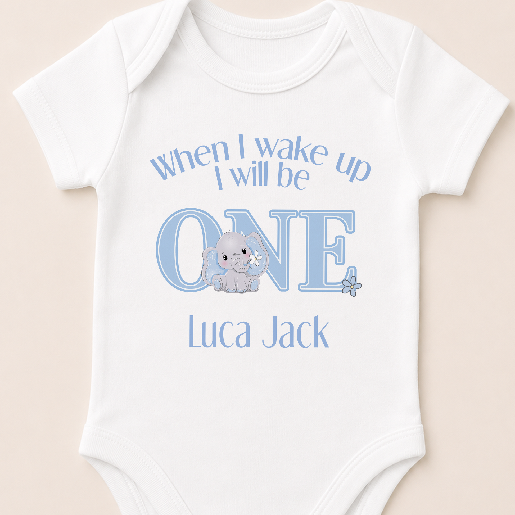 Personalised blue elephant baby grow with the "When I Wake Up I Will Be One" design and personalised name.
