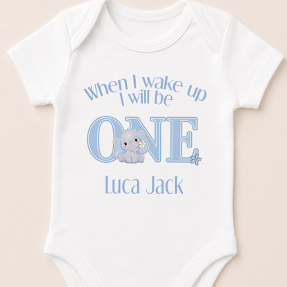 Personalised blue elephant baby grow with the "When I Wake Up I Will Be One" design and personalised name.