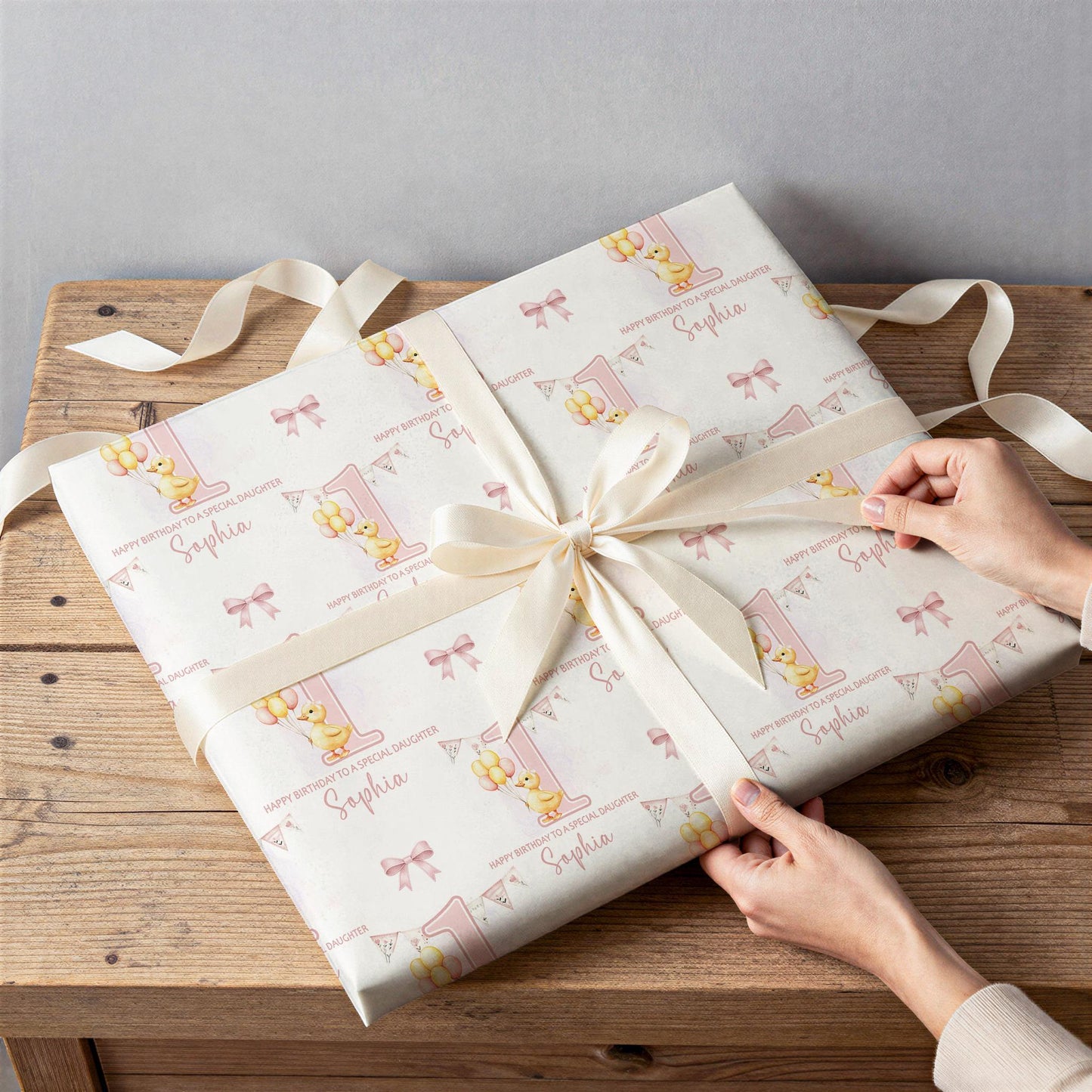Gift wrapped in personalised pink duck wrapping paper