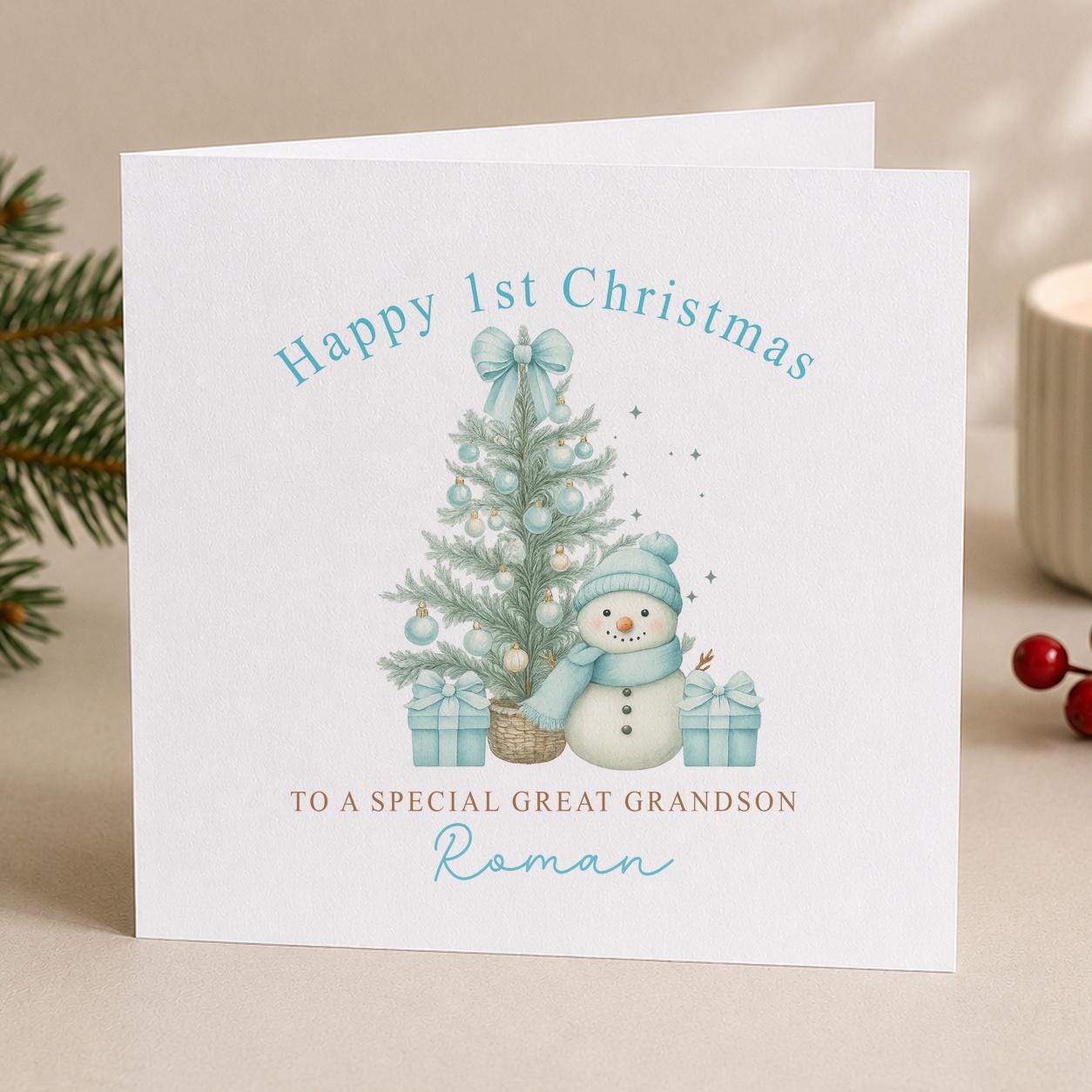 Close up of the personalised snowman first Christmas card showing the relation wording and name