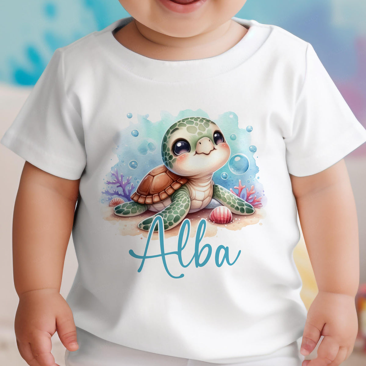 Personalised Sea Turtle baby bib printed with your baby's name, laid flat.