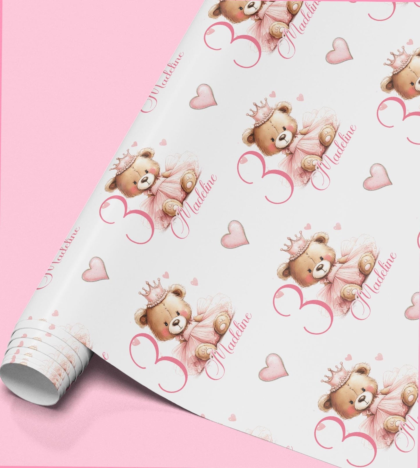 Roll of pink wrapping paper with crowned teddy bears personalised with the name Madeline.