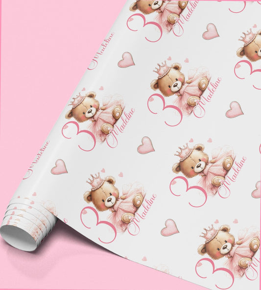 Roll of pink wrapping paper with crowned teddy bears personalised with the name Madeline.