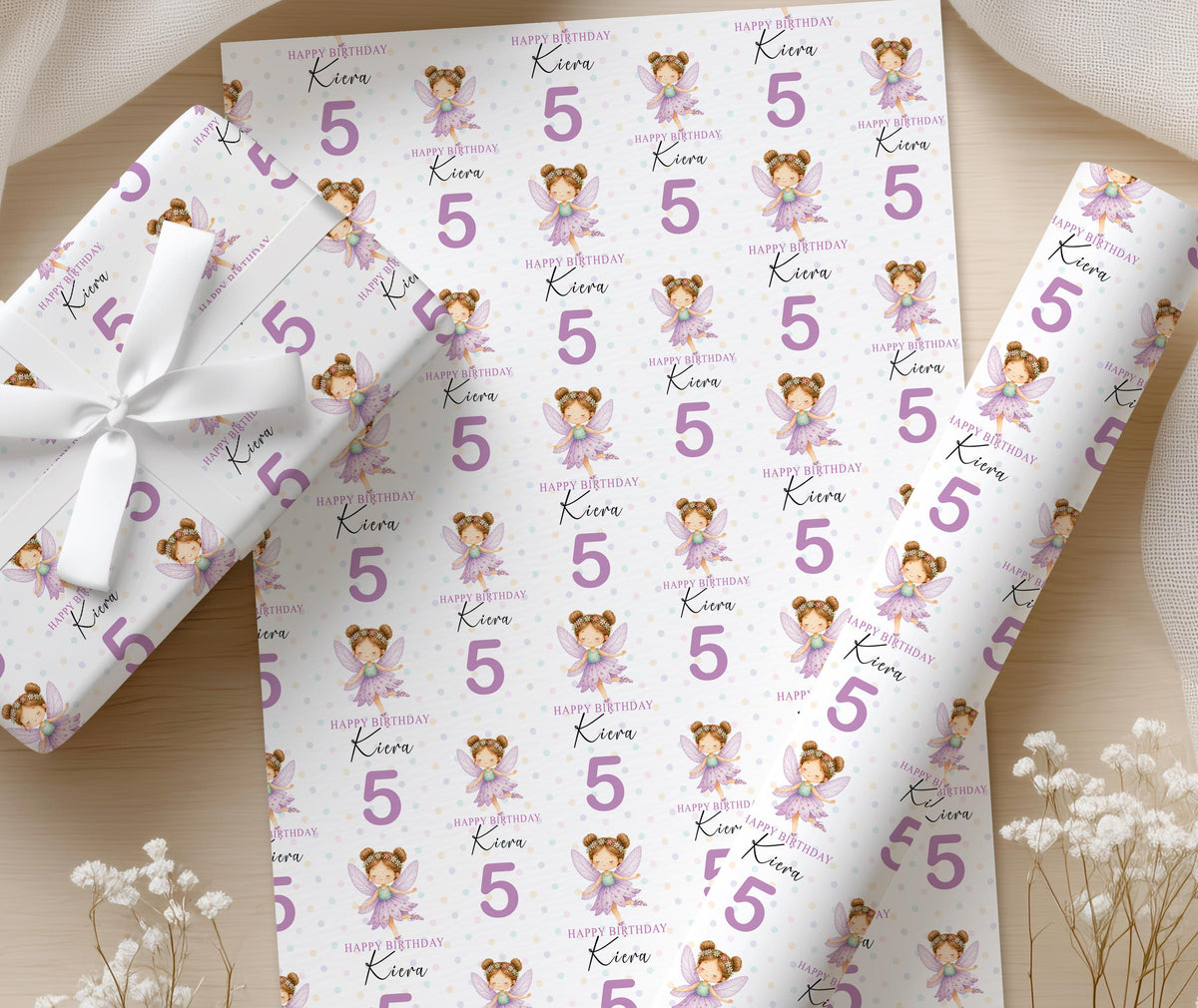 Close-up detail of the personalised fairy wrapping paper pattern