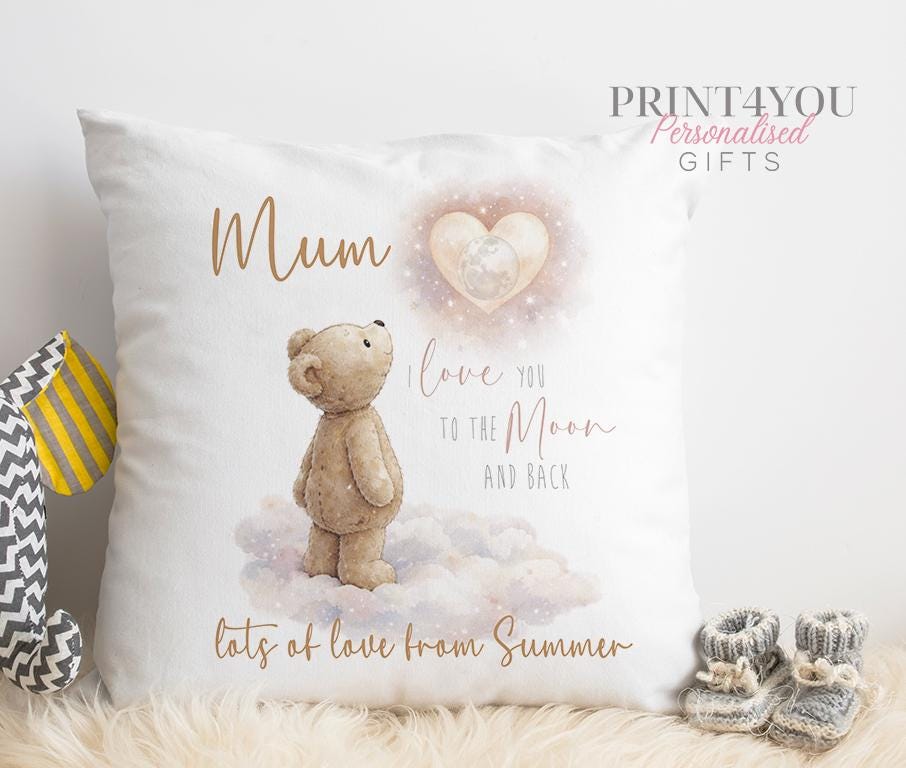 Cushion printed with a personalised teddy bear design and name