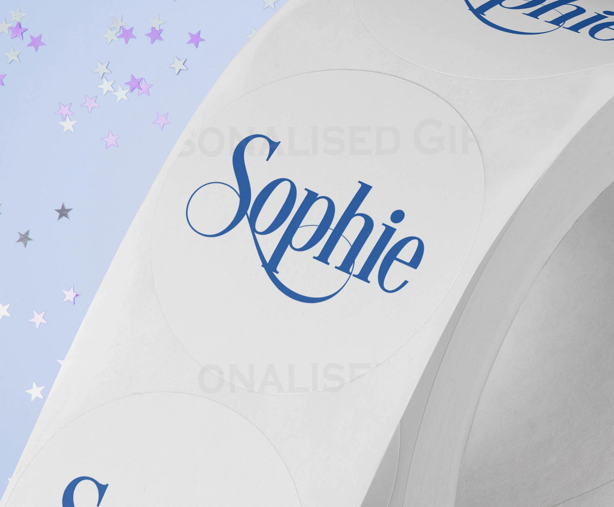 Personalised colourful festive name sticker close-up showing the bright festive design