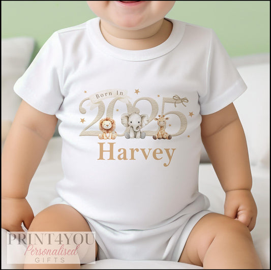 Personalised 'Born in 2025' safari animal bib with baby's name printed on soft white cotton.