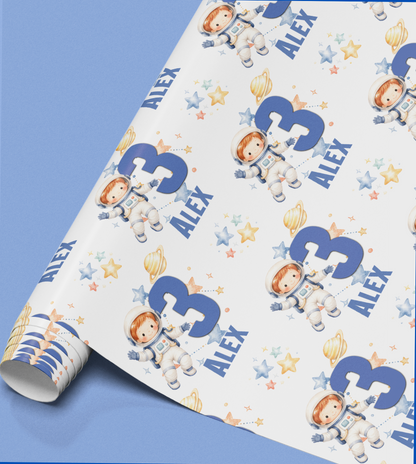Full repeat pattern of the personalised astronaut wrapping paper design showing the astronaut character