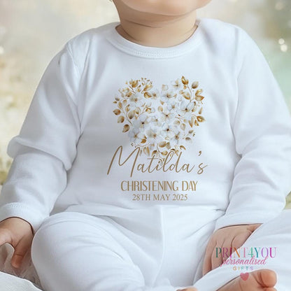 Personalised christening baby outfit, flat lay of sleepsuit and bib
