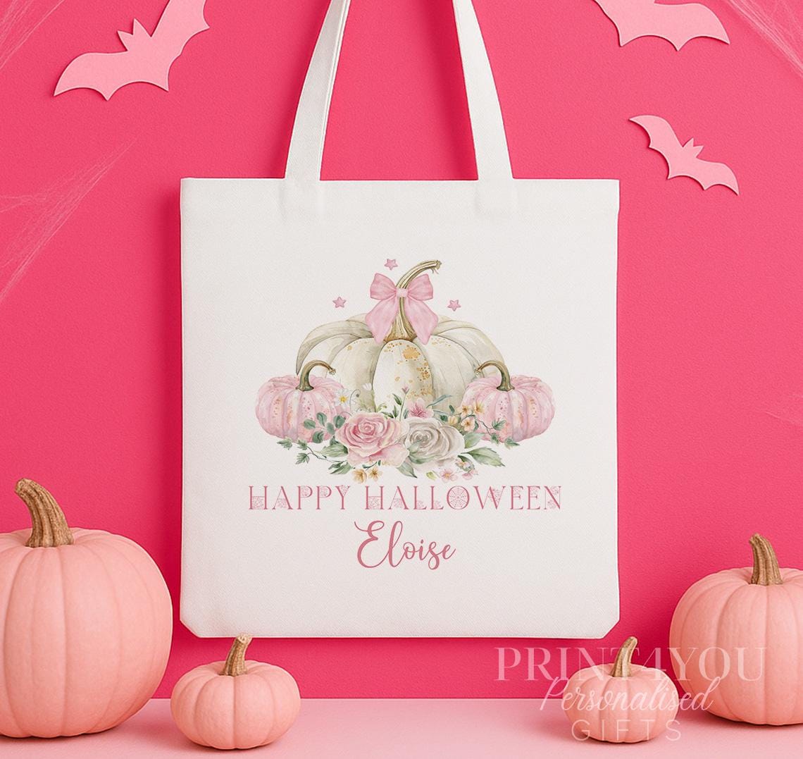 Close-up of the pastel pumpkin and floral print on the personalised Halloween tote bag, showing the custom name detail.