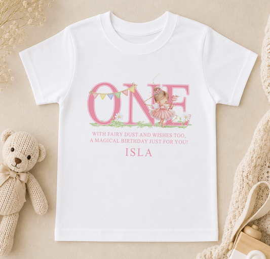 Personalised fairy design first birthday t-shirt with pink 'ONE' and custom name, styled with a teddy bear.