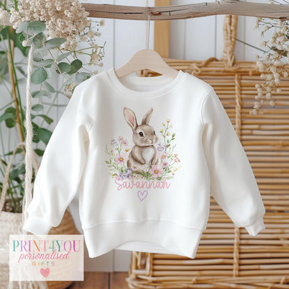 White cotton children's sweatshirt printed with a personalised bunny rabbit and flowers design