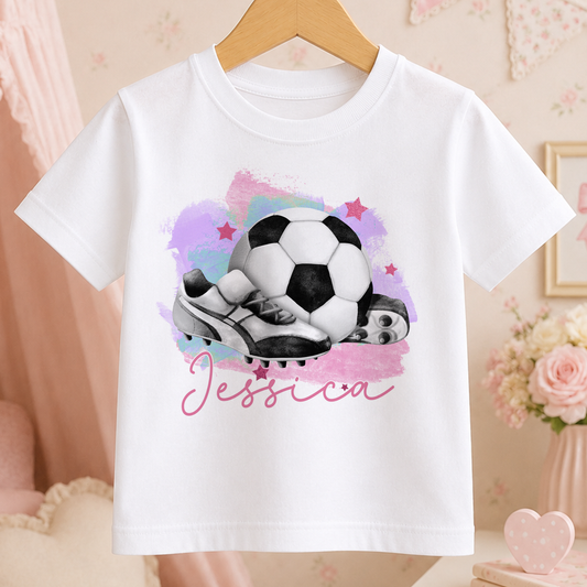 A white t-shirt with a printed design of a soccer ball and cleats, along with the name " Jessica" written below the image.