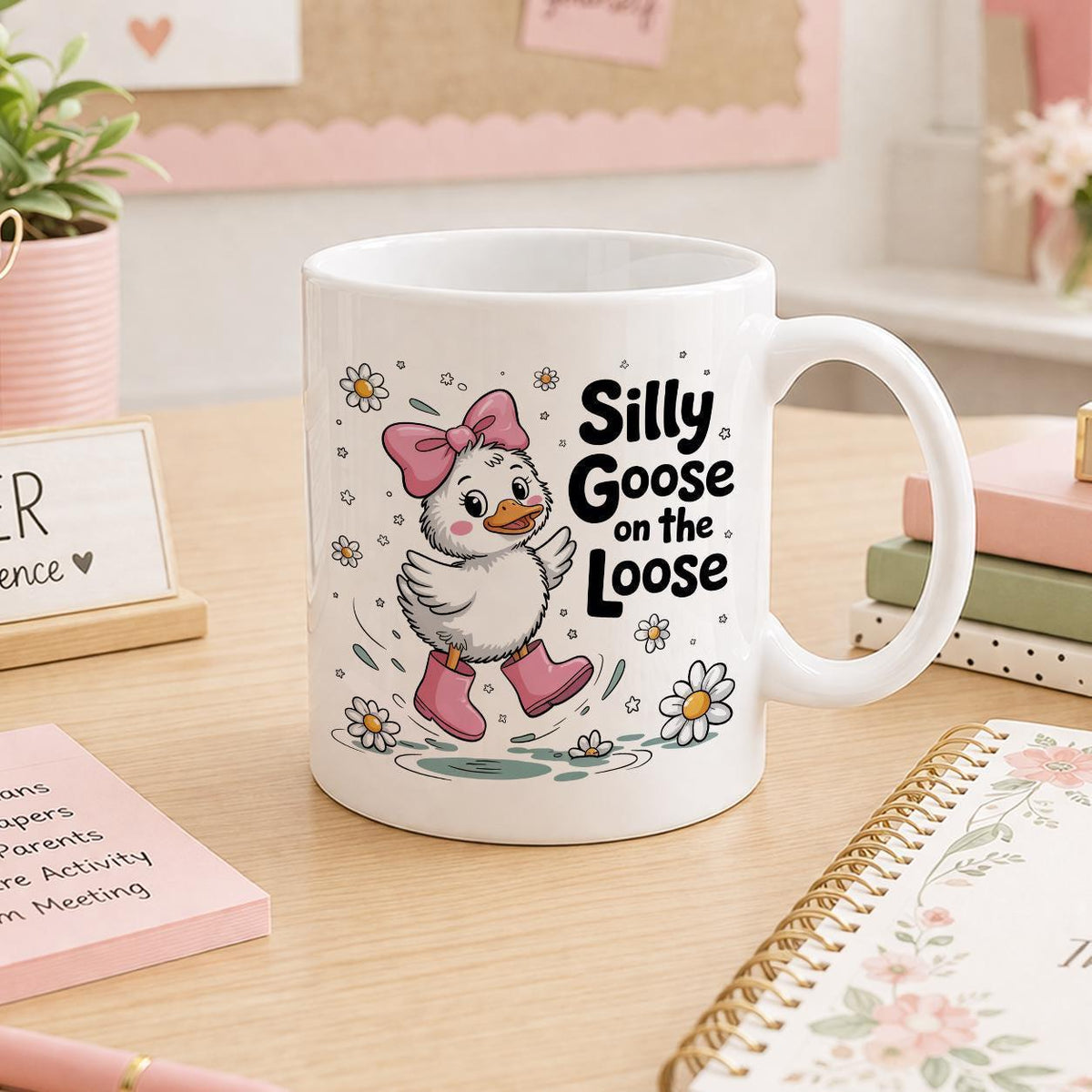 White ceramic mug printed with a cartoon duck and a 'silly goose' slogan
