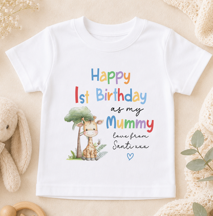 A white t-shirt with a colorful graphic design and text that reads "Happy 1st Birthday as my Mummy love from SANTIXX"