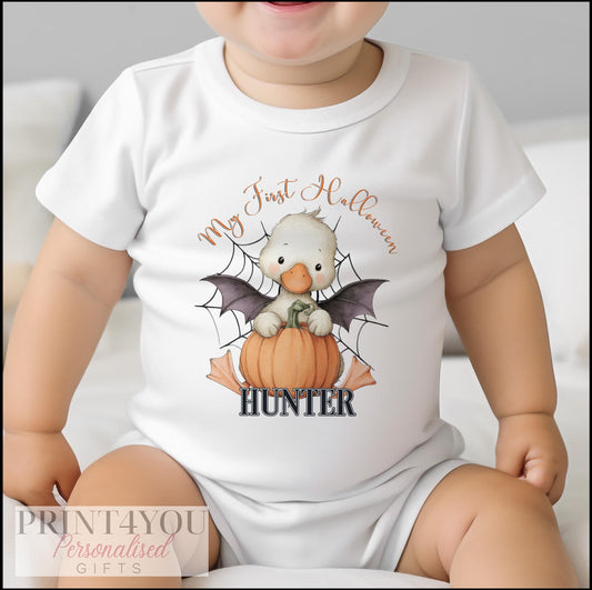 Personalised Halloween baby vest with duck-in-pumpkin design and baby's name printed above the hem.