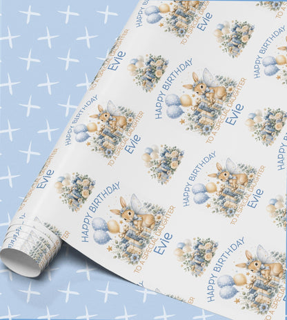 Personalised birthday wrapping paper in soft blue and white with a fairy bunny, balloons and roses, Happy Birthday with a relation and name