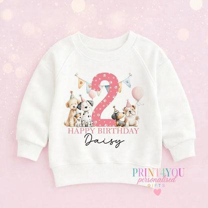 Personalised puppy birthday jumper laid flat, showing the puppy design and custom name print