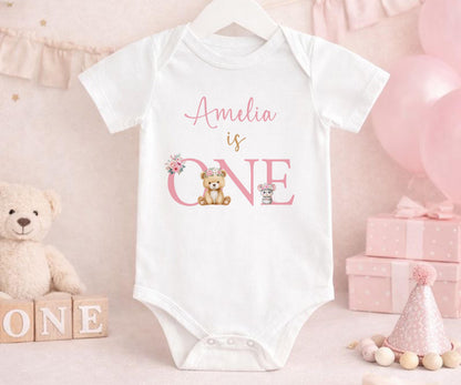 Personalised first birthday vest with floral teddy bear design and custom name, soft cotton