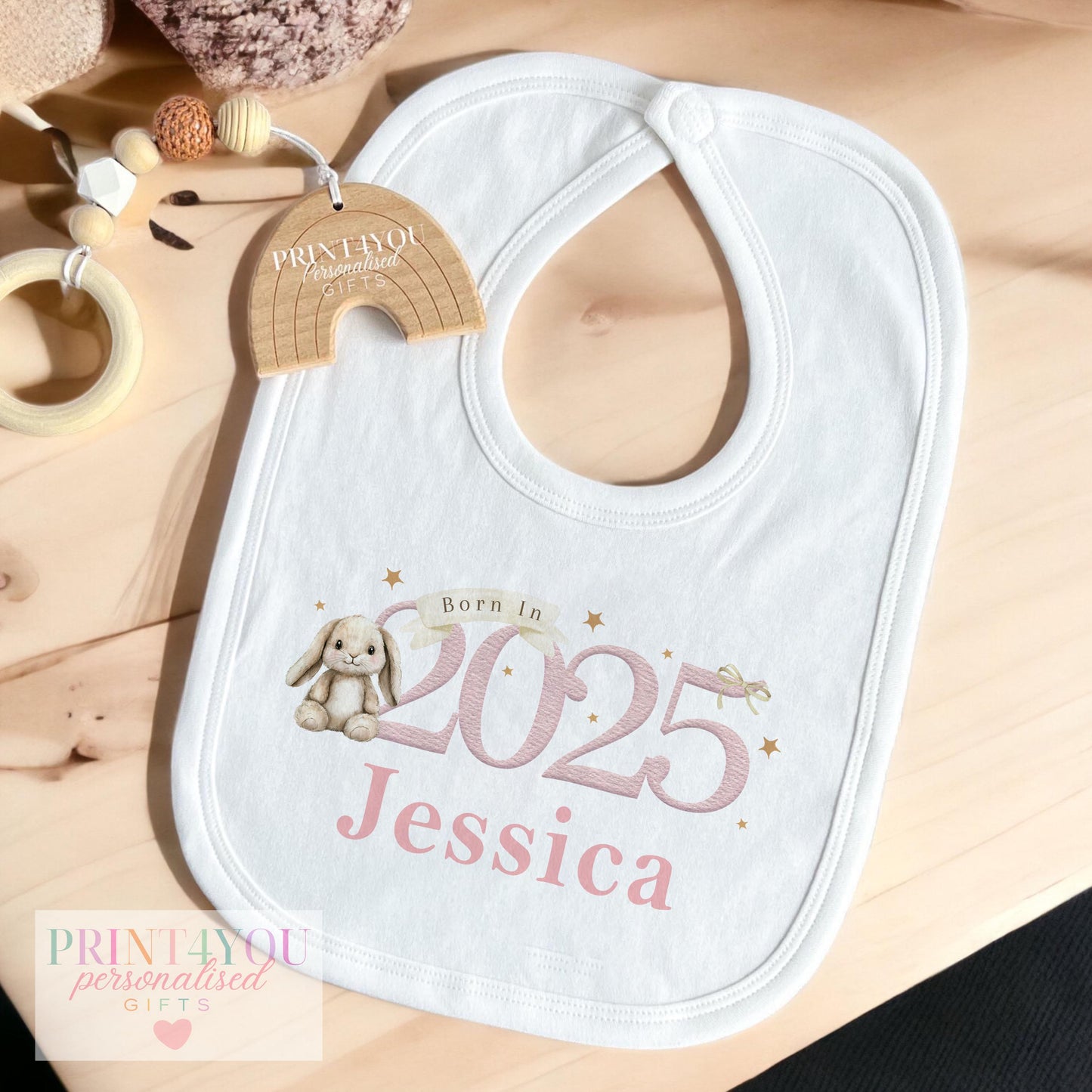 Personalised pink bunny baby vest with custom name print, soft breathable cotton.