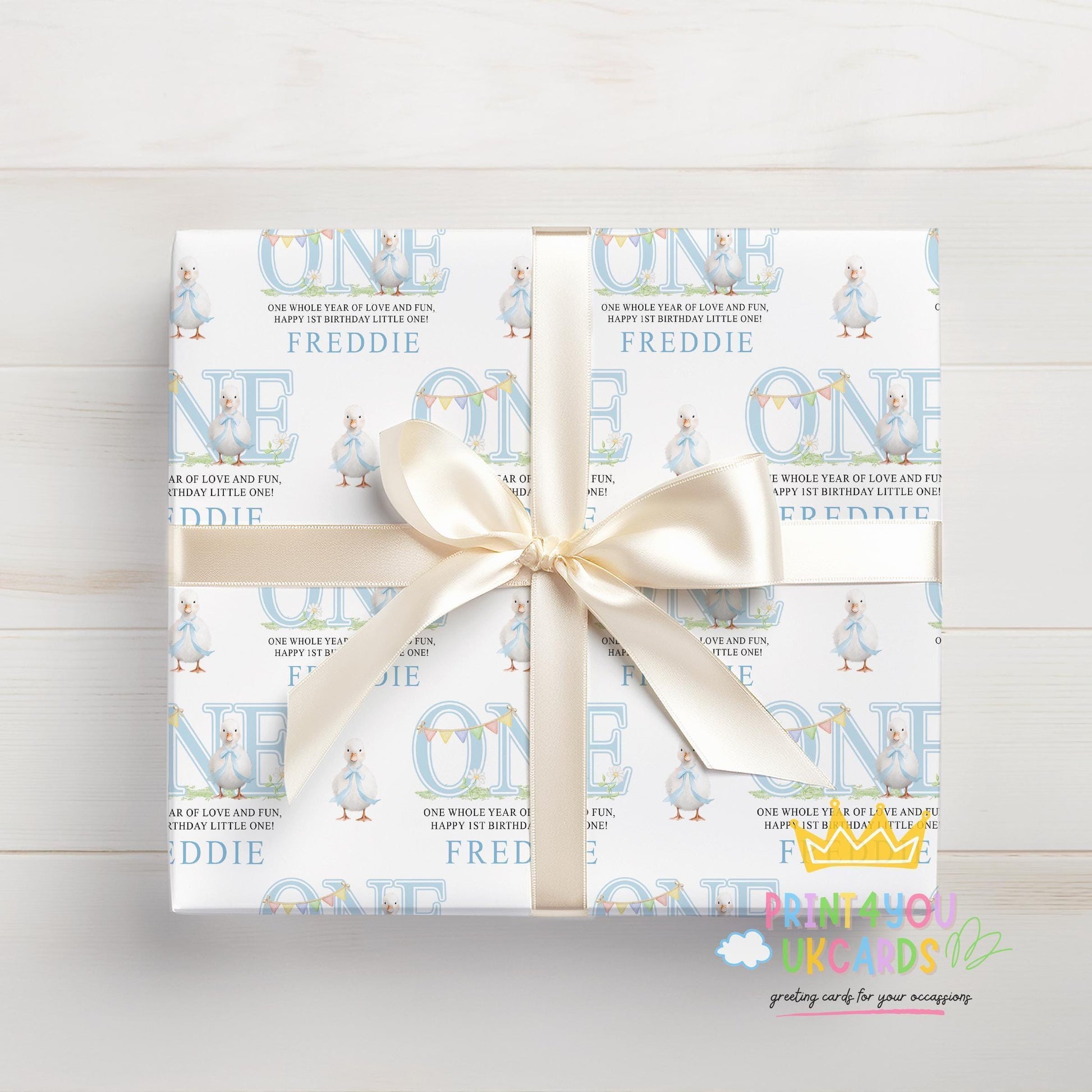 Roll of the personalised blue duck wrapping paper packaged ready for postal delivery.