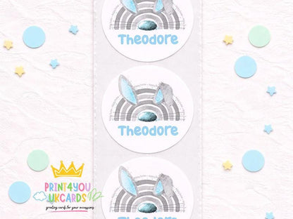 Strip of glossy round blue bunny birthday stickers personalised with a child's name