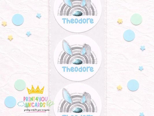 Strip of glossy round blue bunny birthday stickers personalised with a child's name