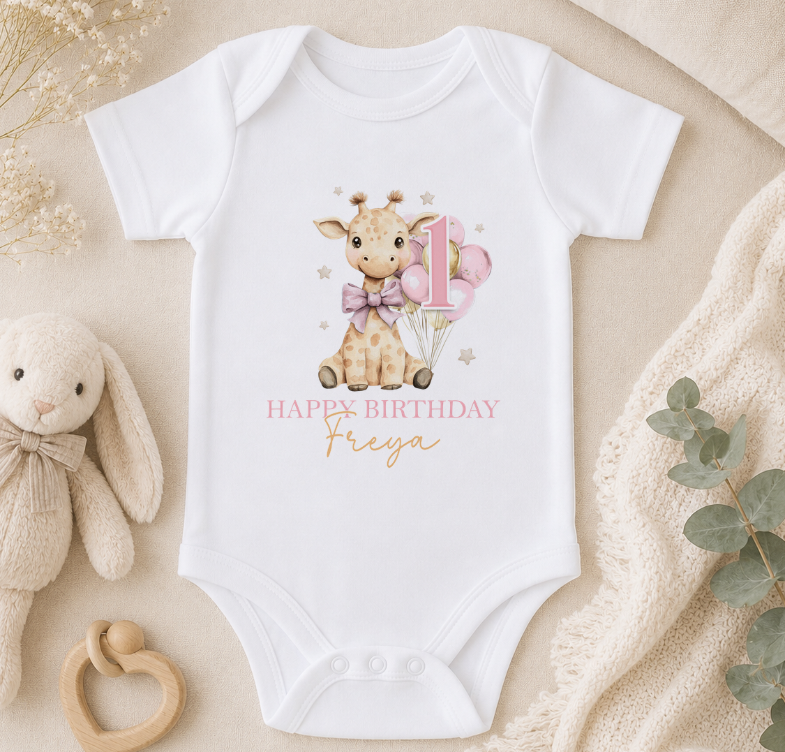 Close-up of the personalised giraffe birthday vest printed with 'Happy Birthday Freya'.