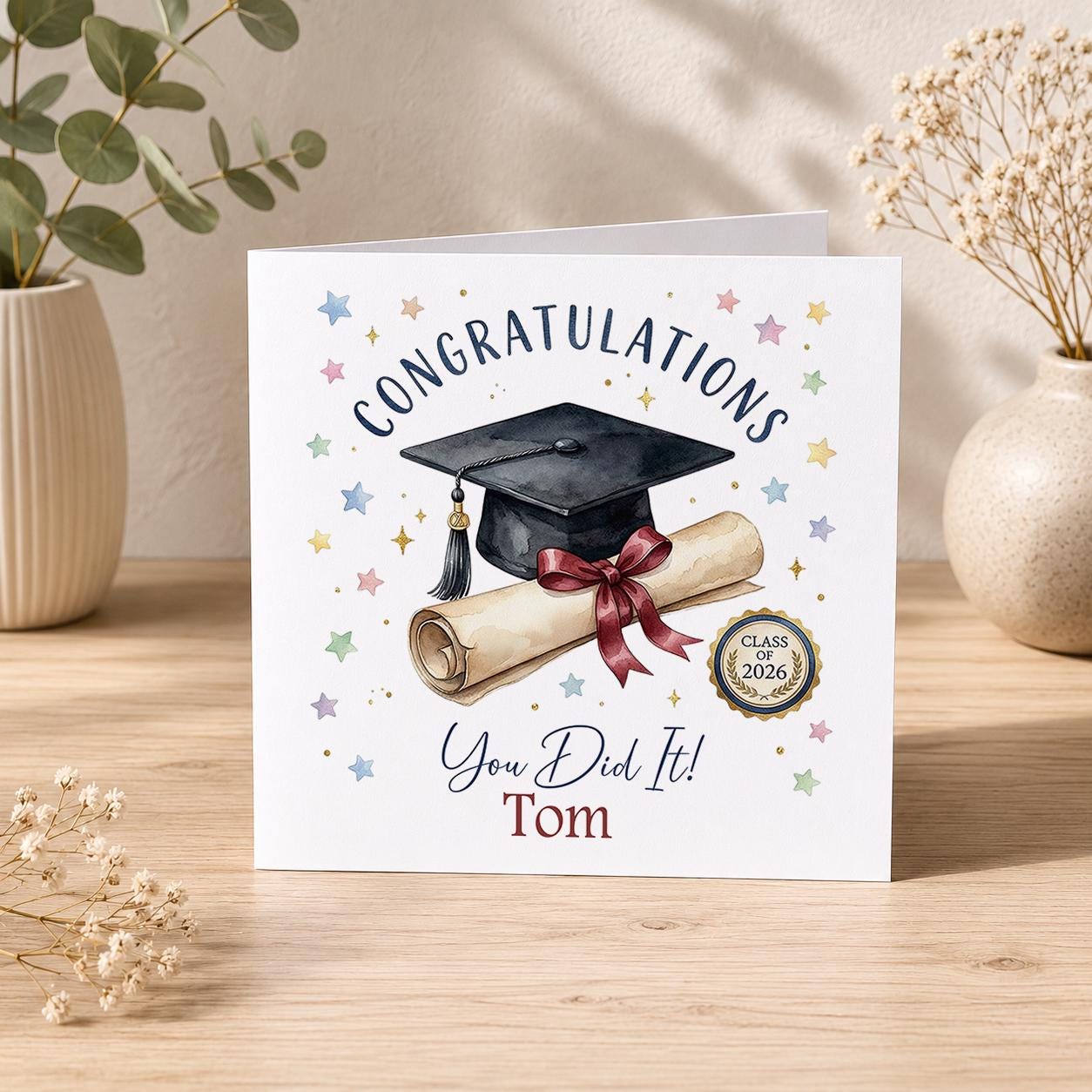 Square greeting card showing the graduation card design