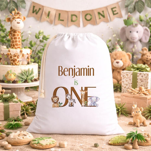 Personalised safari birthday sack laid flat, showing the jungle animal design and printed name