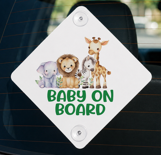Aluminium car window safety sign printed with a lion, giraffe and elephant safari design and the words 'Baby on Board'.