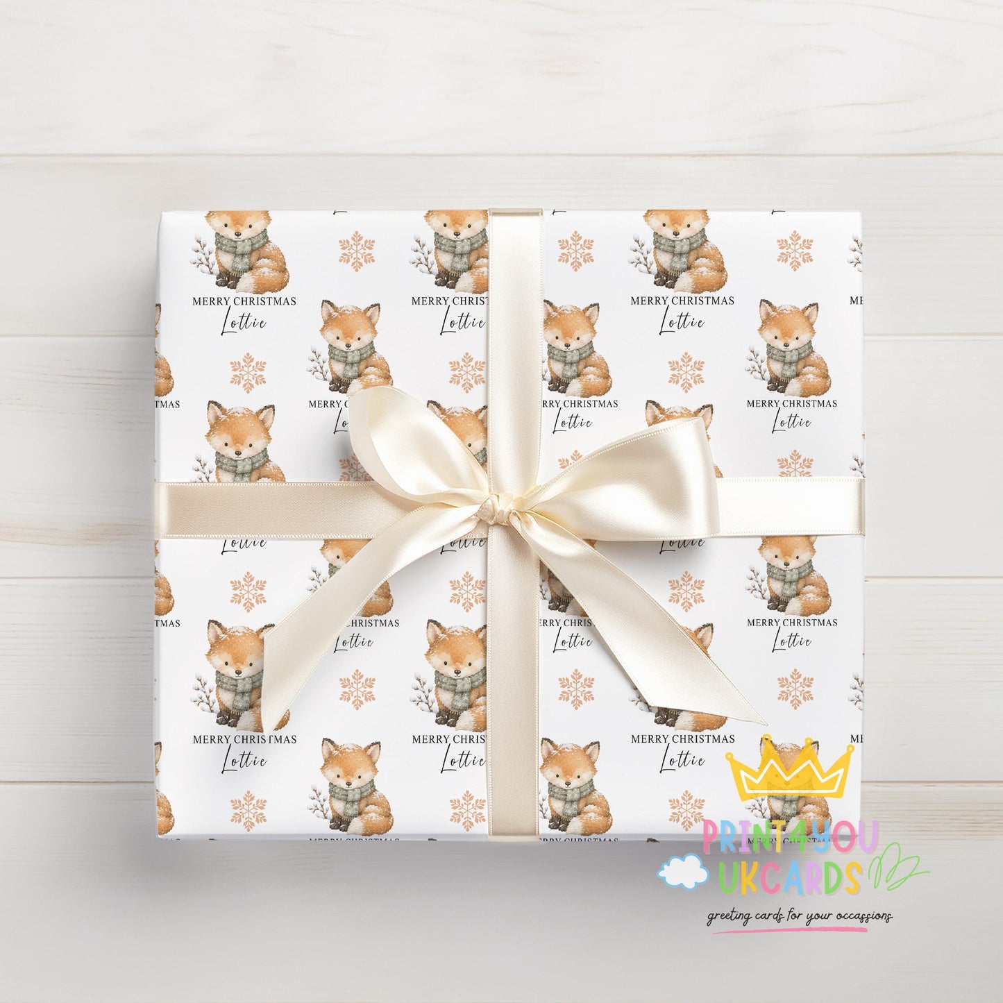 Personalised winter fox Christmas wrapping paper rolled and ready to post in a postal tube