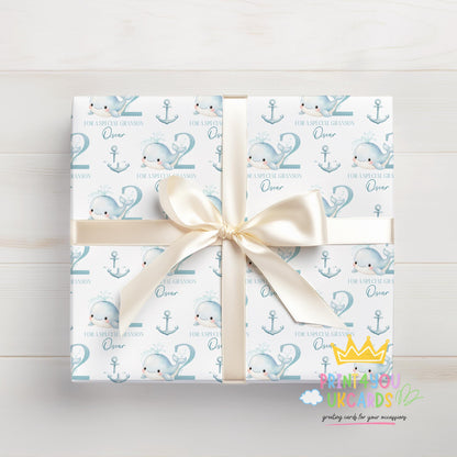 Personalised whale wrapping paper sheet laid flat showing the full pattern