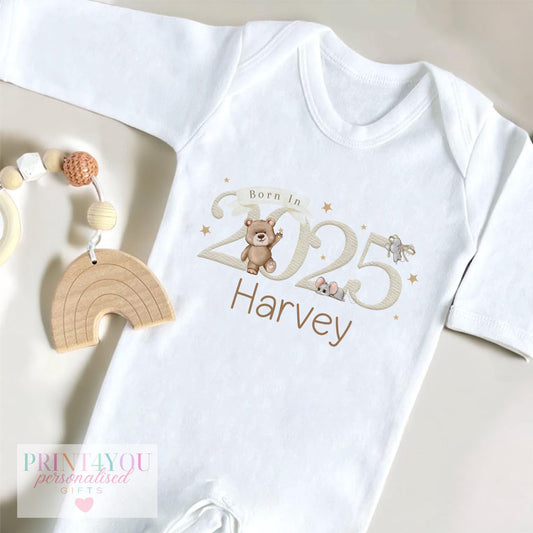Personalised newborn teddy bear bib, printed with baby's name and birth year.
