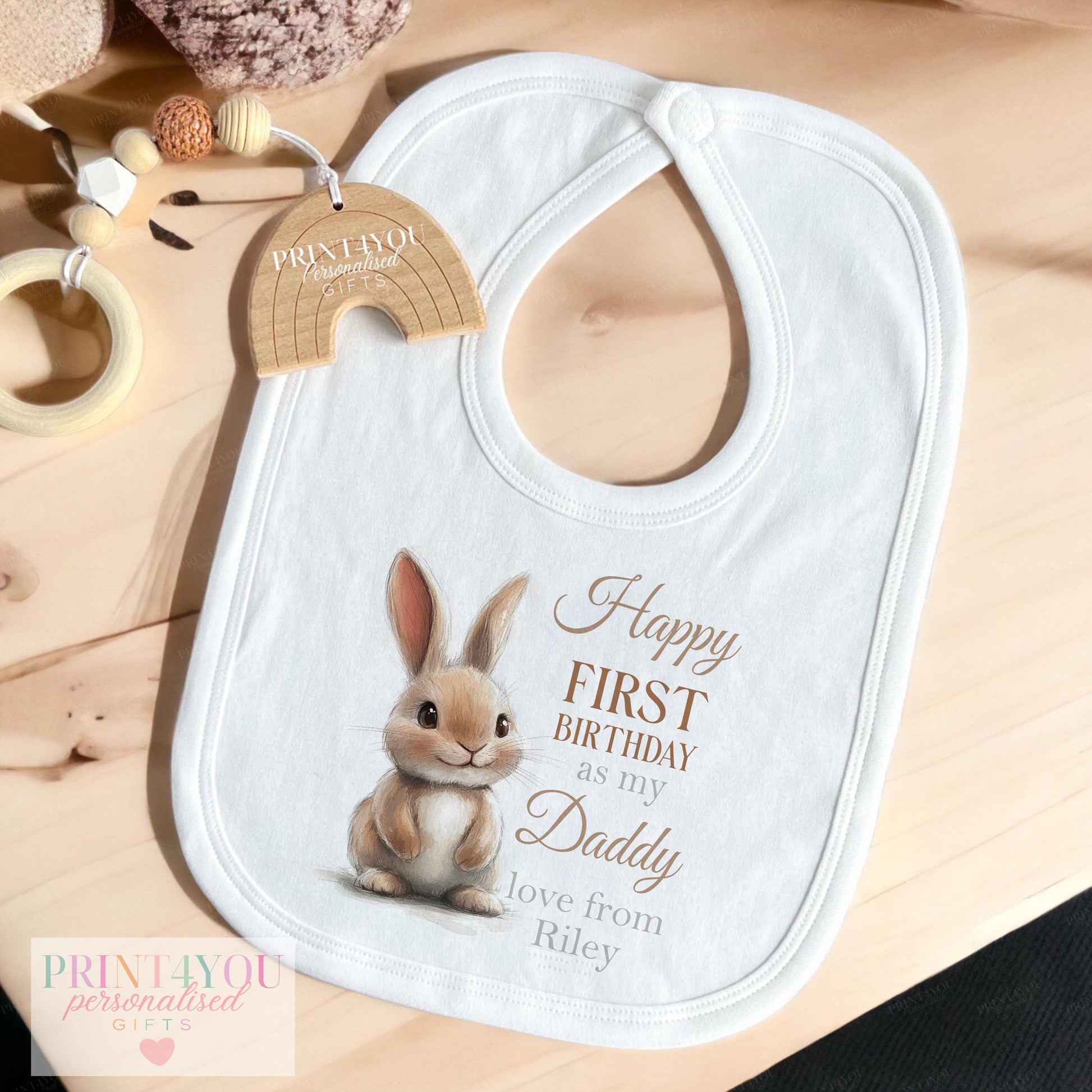 Personalised baby vest featuring the watercolour Daddy Bunny first birthday design and 'love from' message.