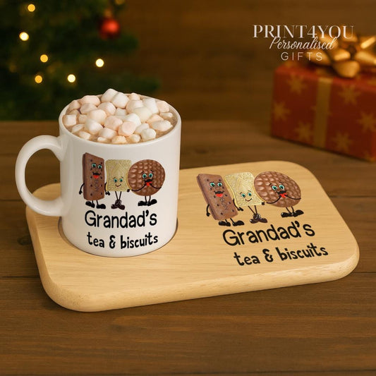 Personalised ceramic mug printed with a custom name, shown alongside a matching wooden snack board for tea and biscuits