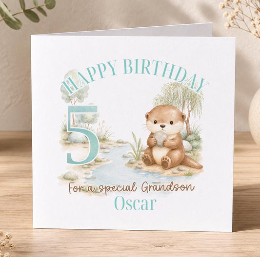 Personalised otter birthday card, white 6x6 inch square card printed with Happy Birthday, an age number, a watercolour otter and a name