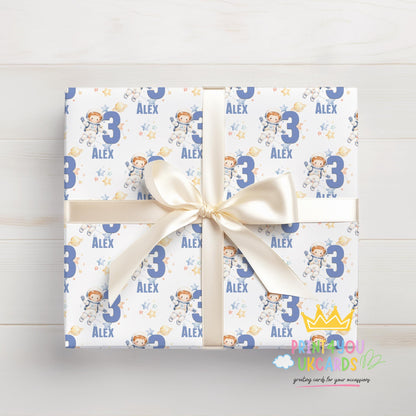 Section of the personalised astronaut wrapping paper showing the astronaut character and personalisation